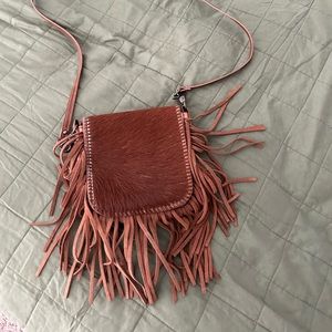 Cowhide fringe side bag